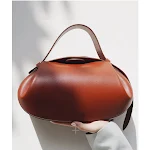 Bolsa feminina casual para carregar na mão ou transversal. Perfeita para o dia a dia, com design moderno e praticidade em um só produto. — foto 6