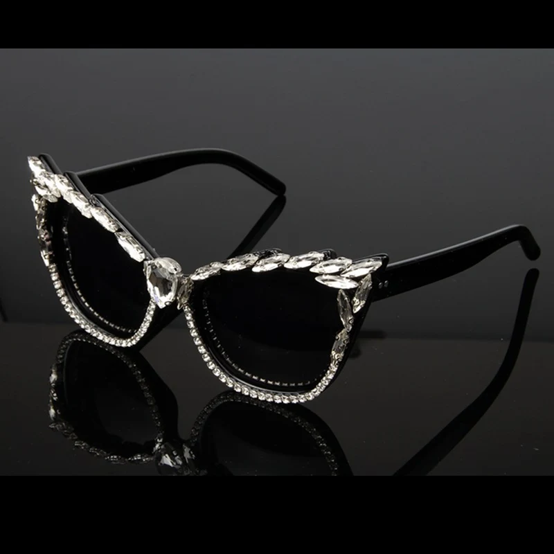 Title 2, Cat eye sunglasses with rhinestones, offering s...