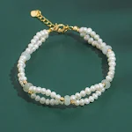 Pulseira de pérolas de água doce trançada à mão, um acessório elegante e atemporal. Perfeita para realçar seu visual, sofisticada e charmosa. — foto 4
