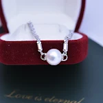 Pulseira de pérolas de água doce brancas, perfeitas, redondas, fortes, com brilho fino e micro imperfeições, para um visual elegante. — foto 1