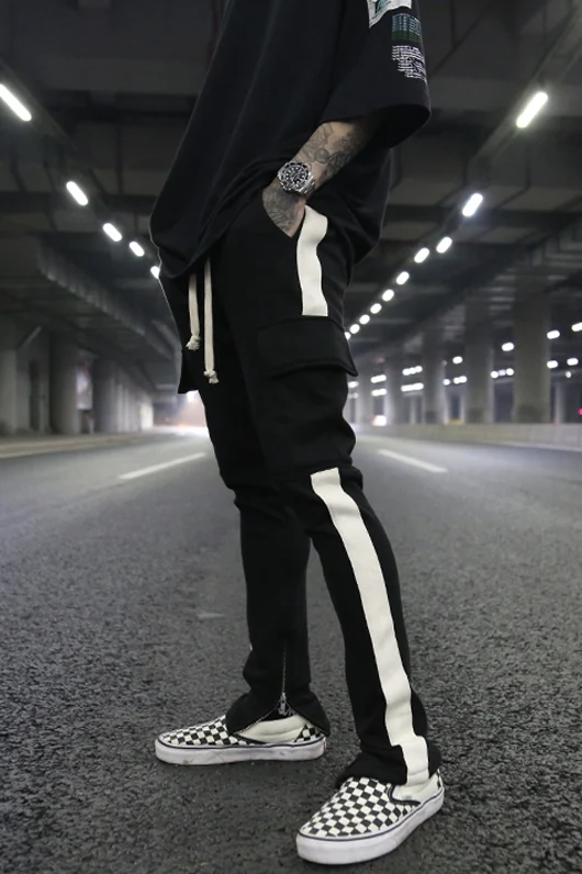 Pantalon décontracté à fermeture éclair, grande poche et ceinture tissée à bord blanc. Confort et style pour un look casual et polyvalent au quotidien. — photo 2
