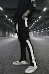 Pantalon décontracté à fermeture éclair, grande poche et ceinture tissée à bord blanc. Confort et style pour un look casual et polyvalent au quotidien. — photo 2