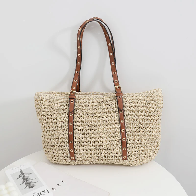 Bolsa de mão feminina de grande capacidade, com design simples e tecido. Perfeita para carregar tudo o que você precisa com elegância e praticidade. — foto 4