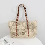 Bolsa de mão feminina de grande capacidade, com design simples e tecido. Perfeita para carregar tudo o que você precisa com elegância e praticidade. — foto 4