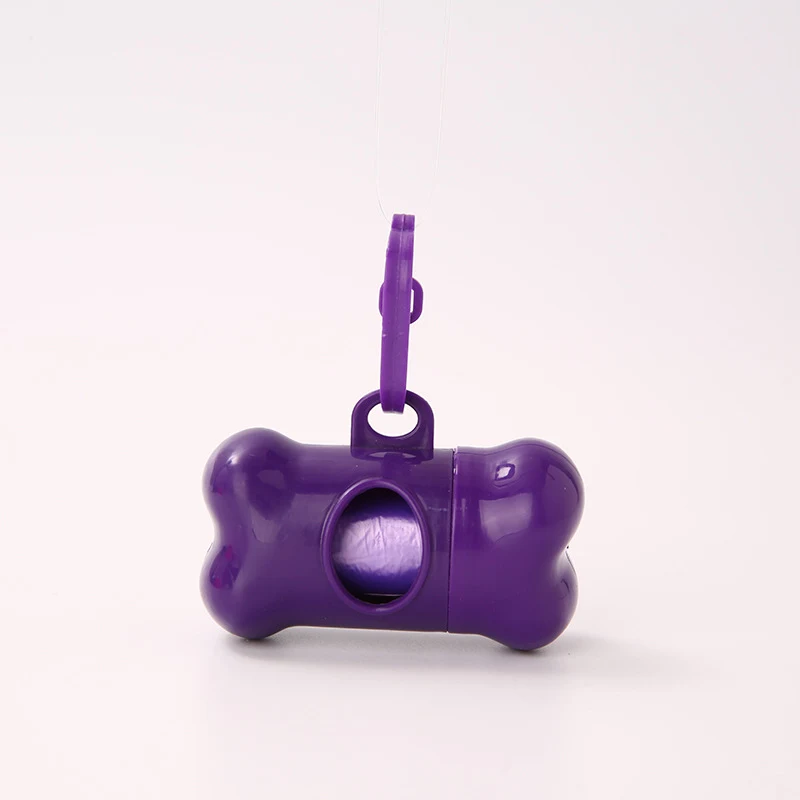 Bone-shaped pet waste bag dispenser, convenient, portable and designed to make picking up after your dog easy on daily w — photo 6