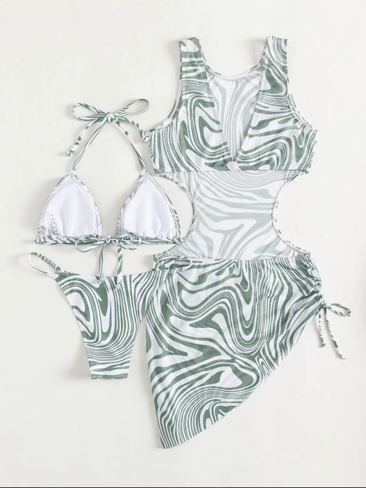 Title 7, Three-piece bikini swimsuit featuring European ...