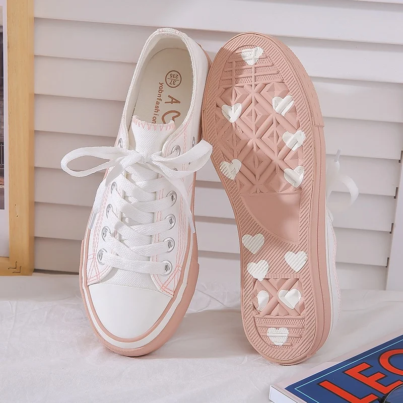 Small dirty orange canvas shoes perfect for a casual and vintage look. Comfortable and stylish, great for everyday wear. — photo 1