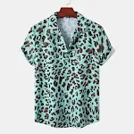 Camicia estiva hawaiana in seta ghiaccio con stampa digitale leopardo, colletto cubano, maniche corte e fiori. Freschezza e stile in spiaggia. — foto 4