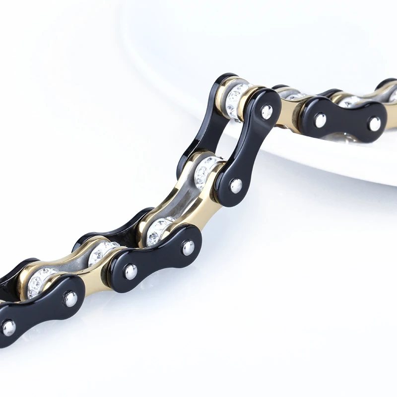 Corrente de bicicleta de aço inoxidável dourada e preta para máquina, resistente e durável, para pedaladas suaves e eficientes. — foto 3