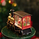 Trenino di Natale con Babbo Natale, neve e musica, giocattoli per bambini. Carillon natalizio perfetto per un regalo speciale e per celebrare il Natale — foto 1