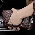 Bolsa carteira masculina antifurto com senha. Mantenha seus pertences protegidos com segurança. Design moderno e funcional para o uso diário. — foto 4