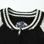 Suéter de manga longa com gola redonda e cores contrastantes. Conforto e estilo combinados para um visual moderno e elegante. — foto 16