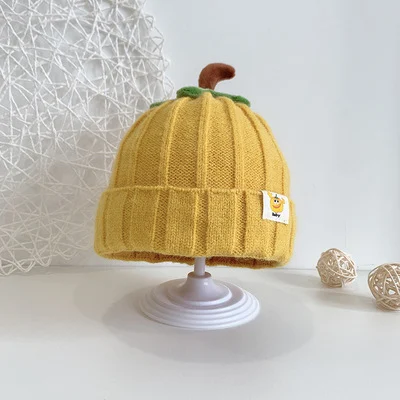Chapéu de inverno infantil grosso e quente com protetores de orelha. Mantenha seus filhos aquecidos e confortáveis durante o inverno, ideal para brincar ao ar livre. — foto 1