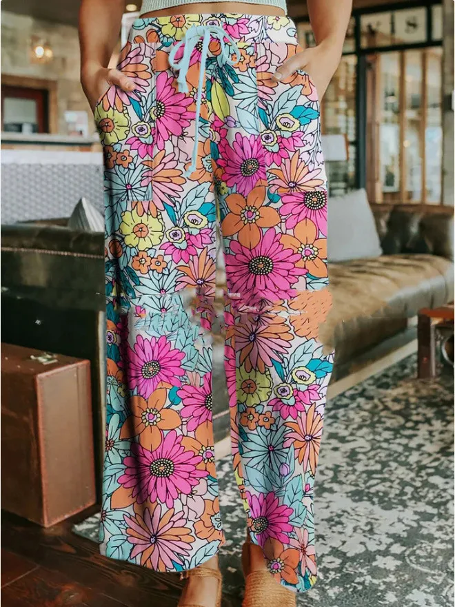 Calças femininas soltas com estampa floral e cordão. Conforto e estilo para o dia a dia. Perfeitas para um visual leve e moderno. — foto 8