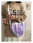 Bolsa transversal transparente em formato de coração, combina com tudo e é perfeita para looks leves e modernos, ideal para diversas ocasiões e estilos. — foto 23