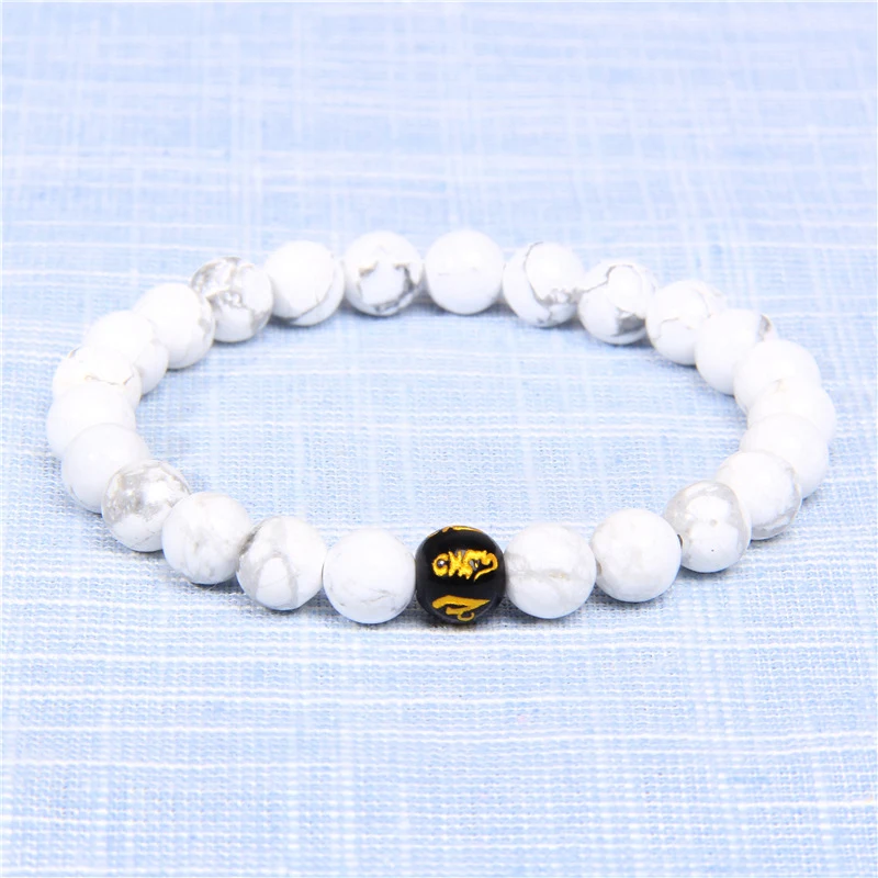 Title 10, Bracelete do mantra de seis caracter