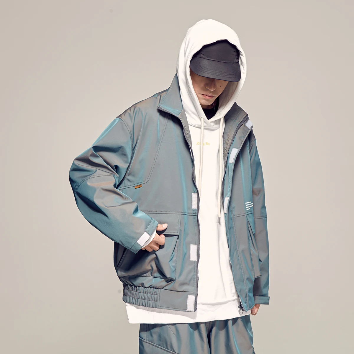 Spring's new reflective jacket with a vibrant colorful gradient design. Stay visible and stylish in low light, perfect f — photo 4