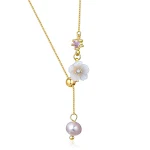 Corrente de clavícula ajustável com pingente de flor de concha e pérolas naturais, elegante e charmosa para mulheres. — foto 1
