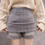 Saia feminina nova de lã xadrez de cintura alta e corte justo. Moda e elegância para um visual moderno e charmoso. — foto 3