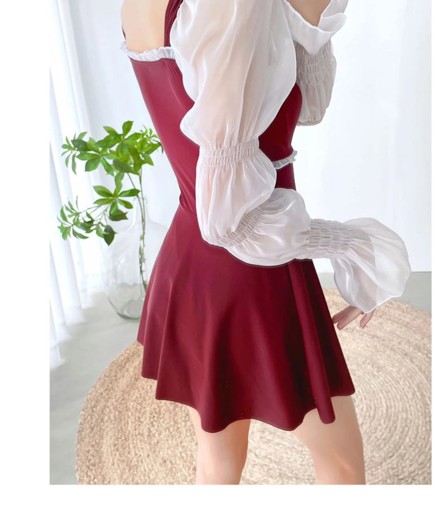 Title 2, Long-sleeved conservative one-piece skirt swims...