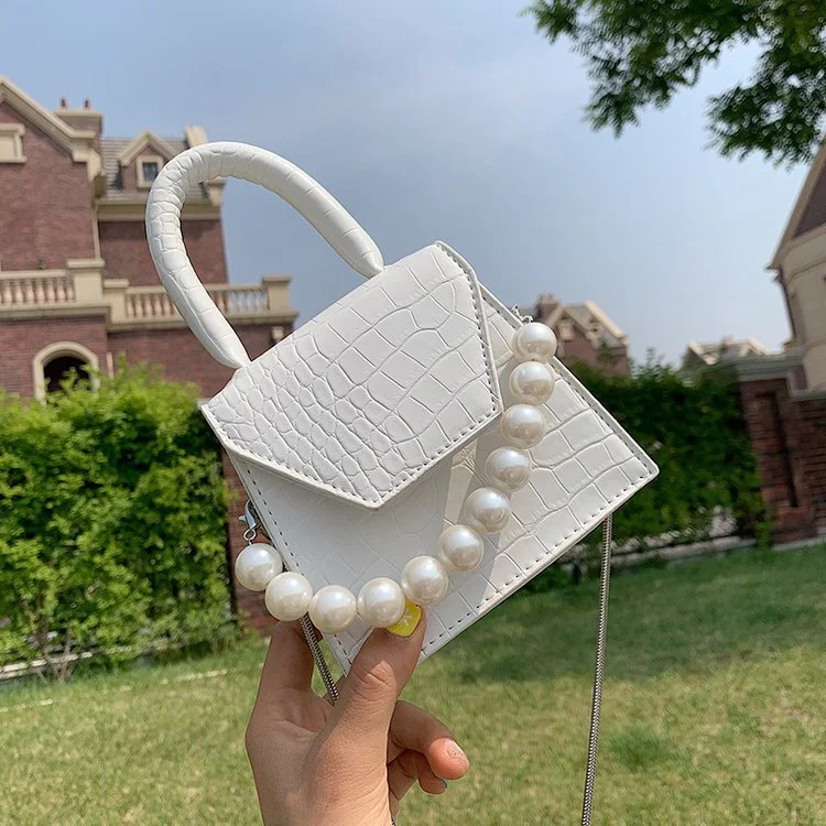 Charmosa mini bolsa portátil de pérolas. Ideal para guardar maquiagem, fones de ouvido ou chaves. Leve e elegante. — foto 1