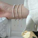 Retro parelarmband, elegant en temperamentvol. Een sieraad voor vrouwen die op zoek zijn naar tijdloze elegantie en stijl. — foto 7