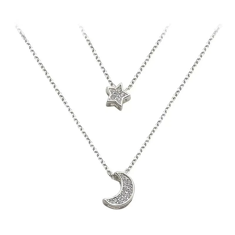 Colar Duplo Estrela Lua com Diamantes Cintilantes Brilhe com este acessório elegante. Perfeito para adicionar um toque de sofisticação ao seu visual. — foto 1