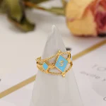 Anel de aço titânio com padrão de olho prismático gotejante multicolorido. Design único, resistente e estiloso. Perfeito para qualquer ocasião. — foto 4