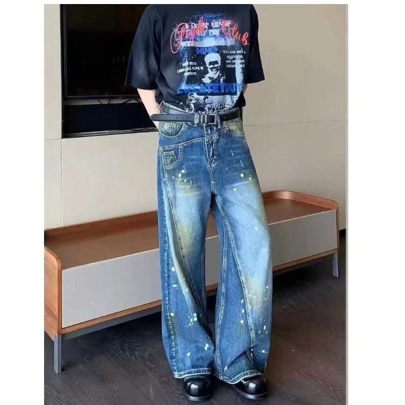 Calças jeans Retro Minority com respingos de tinta, desconstrução e costura. Unissex, para homens e mulheres. Estilo único e moderno. — foto 5