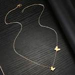 Colar com pingente de borboleta em aço inoxidável Design de nicho versátil e charmoso. Combinação perfeita para um visual doce e estiloso. — foto 17