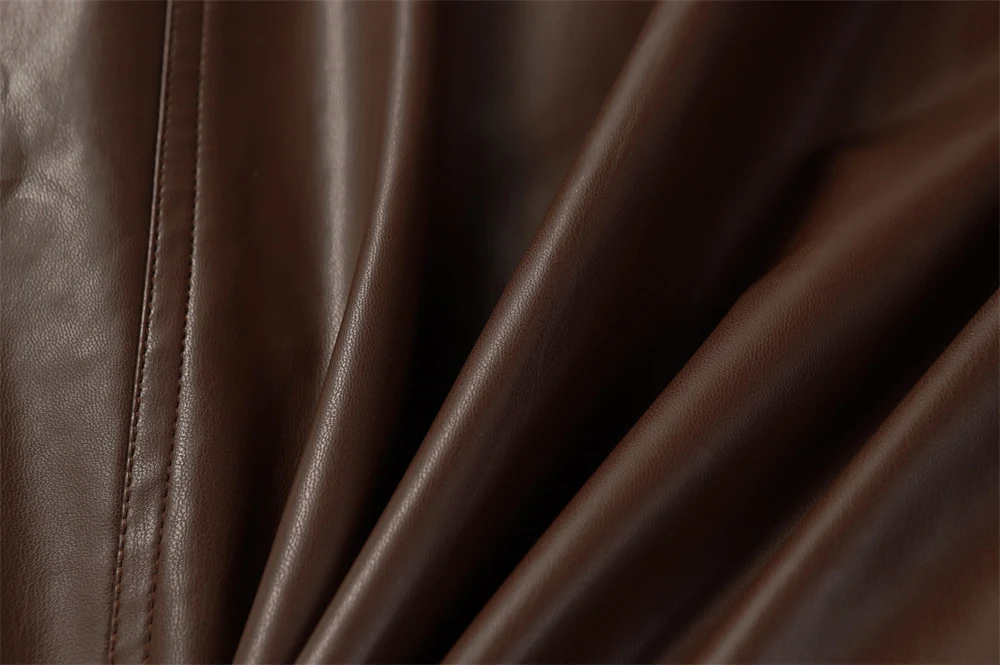 Niche Asymmetric Stitching Contrast Color Leather Jacket. Elevate your style with this unique jacket. Perfect for a bold — photo 1