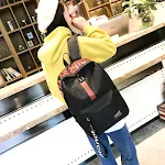Mochila de lona grande com design de letras fashion. Amplo espaço interno para uso diário, escola ou viagens. Estilo e praticidade. — foto 17