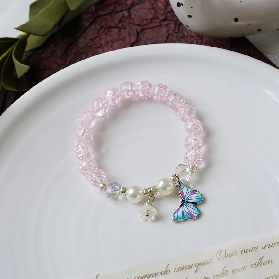 Pulseira feminina com contas de pérolas e cristais, um acessório elegante e brilhante para complementar qualquer look, ideal para eventos especiais e festas. — foto 87