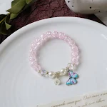 Pulseira feminina com contas de pérolas e cristais, um acessório elegante e brilhante para complementar qualquer look, ideal para eventos especiais e festas. — foto 87