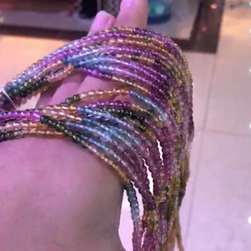 Pulseira colorida com gemas e múltiplos círculos, um acessório vibrante que adiciona estilo e elegância ao seu visual diário — foto 5