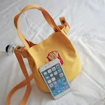 Bolsa de ombro de lona estilo Japão e Coreia, simples e tipo saco, ideal para escola, compras e estudantes. Design moderno e funcional! — foto 3
