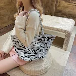 Zebra-striped tote bags, stylish and spacious for everyday essentials. Carry your belongings with flair and enjoy the pe — photo 3