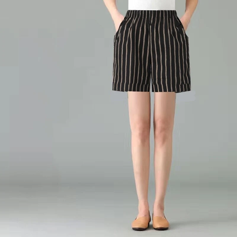 Dames losse katoenen en linnen shorts met elastische taille. Casual en comfortabel voor dagelijks gebruik. — foto 12