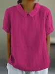 Camisa feminina de manga curta com lapelas soltas. Conforto e estilo em uma peça. Ideal para o dia a dia e diversas ocasiões. Leve e elegante para você. — foto 6