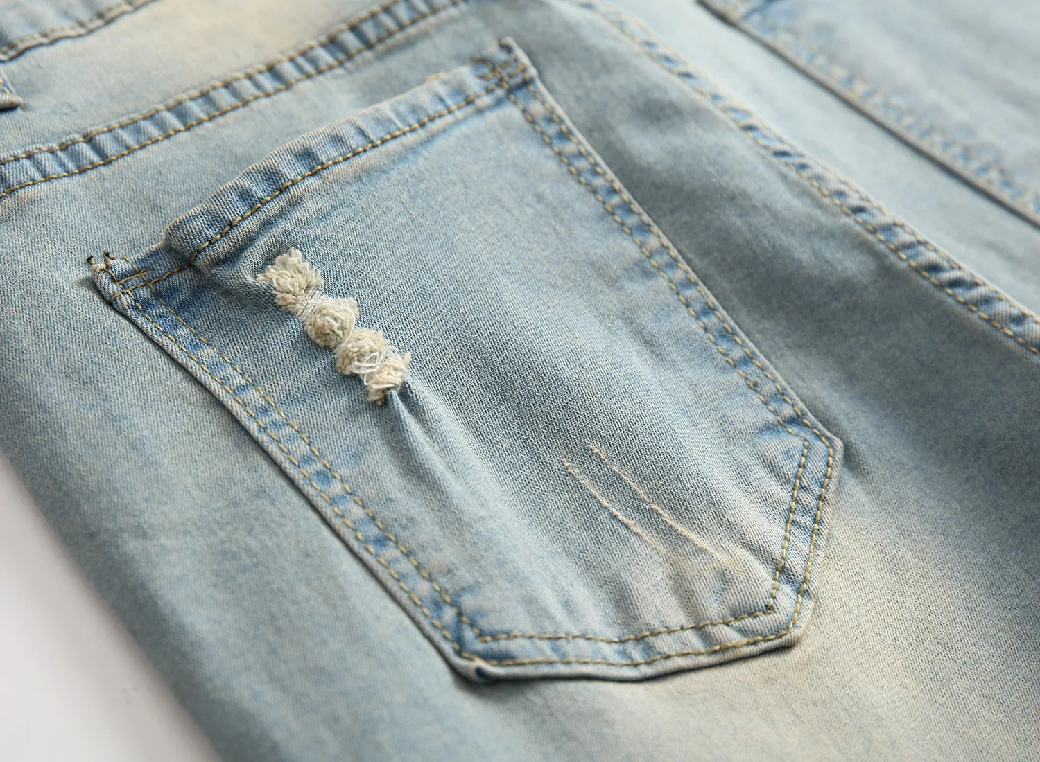 Title 34, High elastic ripped slim jeans for ultimate com...