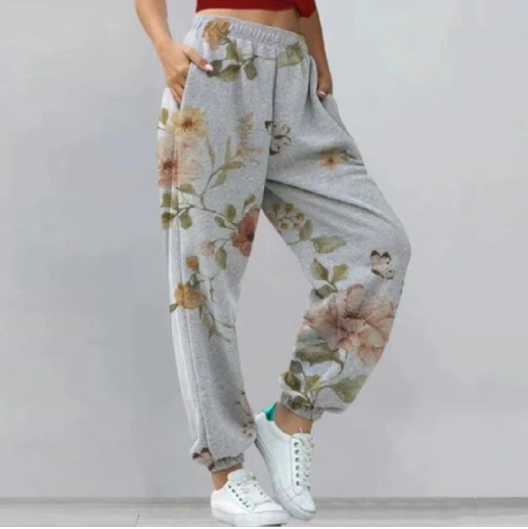 Ženske ležerne široke pantalone sa fiksnim cvetovima. Uživajte u udobnosti i stilu ovih širokih pantalona idealnih za svakodnevno nošenje. — foto 8