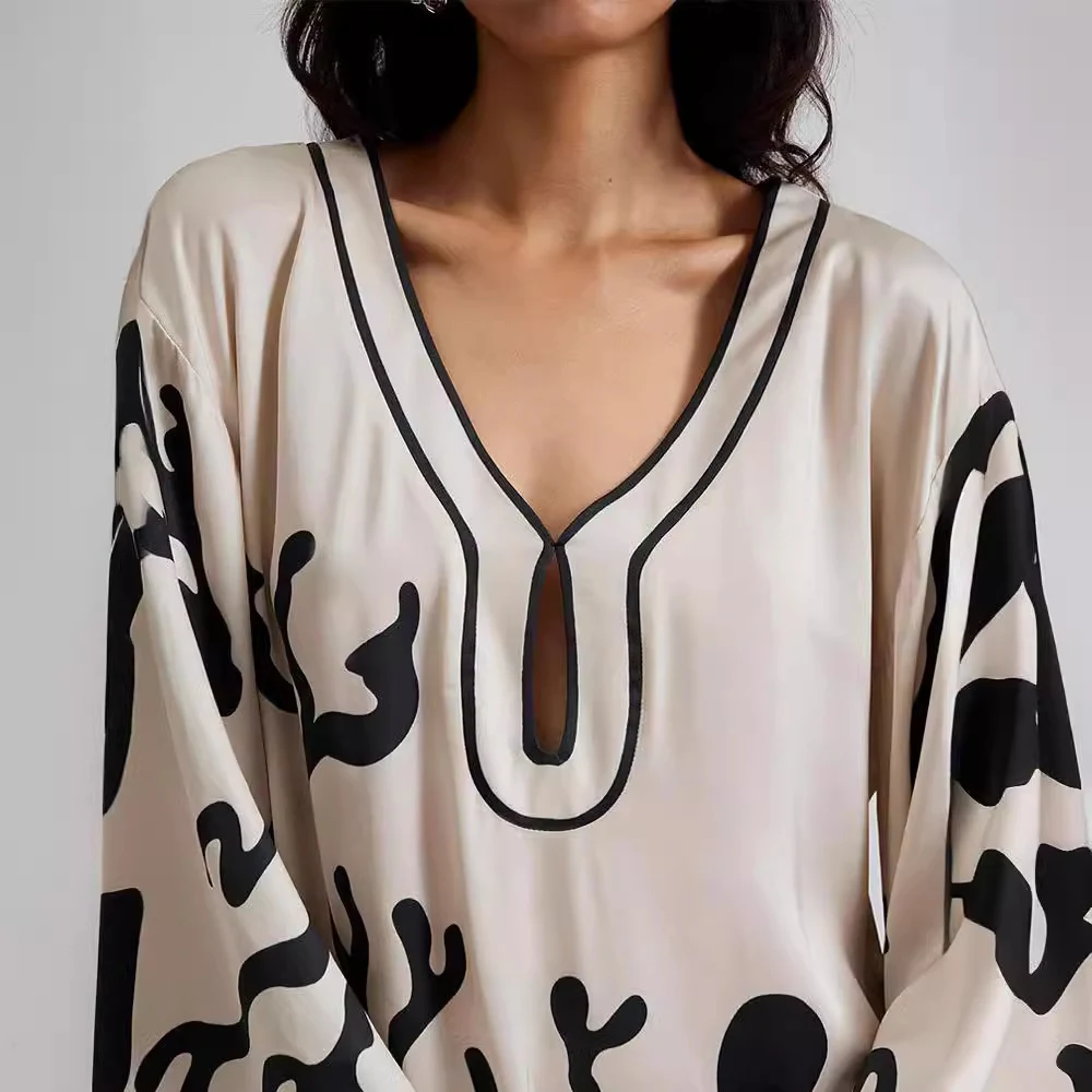 Nieuwe damesjurk met lange mouwen en print — foto 1