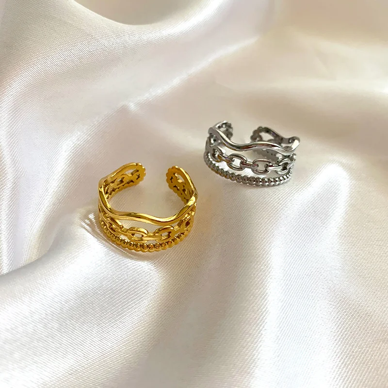 Eenvoudige ring van titanium staal met 18K goud, golvende ronde kralen met drie lagen, voor een unieke en stijlvolle look. — foto 7