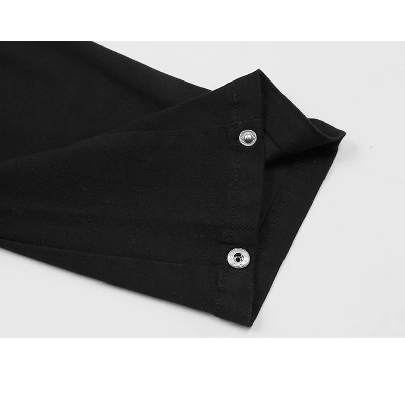 Licht uitlopende broek met strappy ritszomen voor een stijlvolle en moderne look. Perfect voor een comfortabele en modieuze outfit. — foto 1
