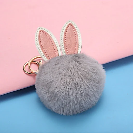 Title 5, Girls Schoolbag with Fuzzy Ball Pendant, a sma...
