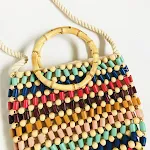 Bolsa de ombro feminina artesanal com tranças e pérolas, charmosa e funcional. Um acessório perfeito para complementar seu visual em qualquer ocasião. — foto 3