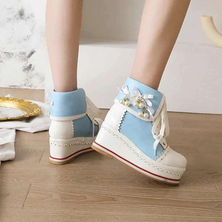Zapatillas deportivas con plataforma y cuña a la moda con cordones y bloques de color, ideales para un look moderno y cómodo para cualquier ocasión. — foto 10