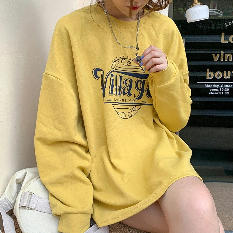 Blusa solta com estampa de letras fashion para mulheres. Confortável e estilosa, ideal para um visual casual e moderno. Perfeita para o dia a dia. — foto 13