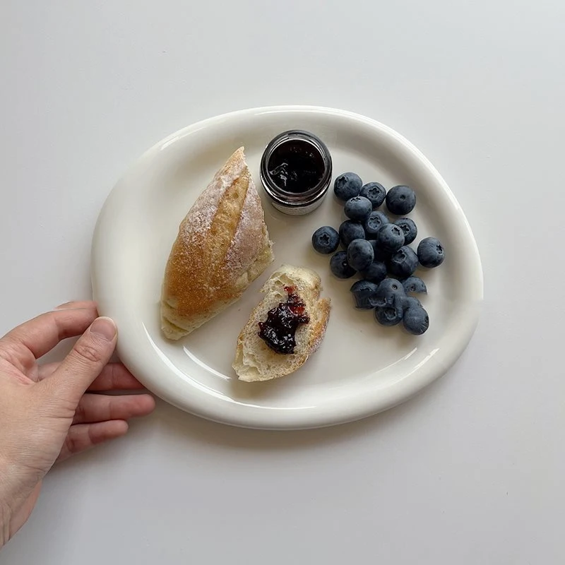 Korean Style White Fat Edge Ceramic Plate. Elevate your dining experience with this stylish plate, perfect for elegant f — photo 7