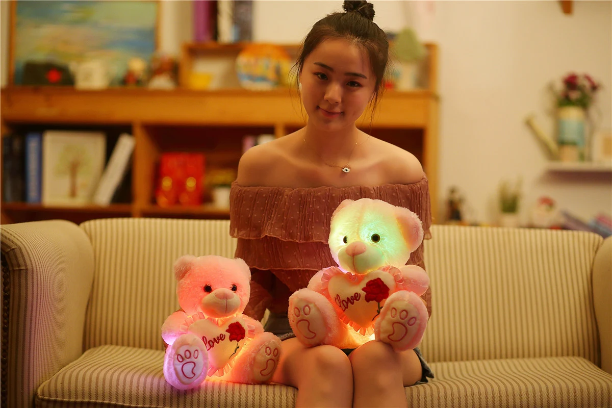 Title 7, Multicolored Glowing Buttons Bear Doll, a fluor...